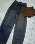 Jeans chiusura asimmetrica