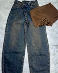 Jeans chiusura asimmetrica