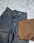Jeans chiusura asimmetrica